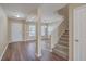 Bright foyer with hardwood floors, stairs leading to the second floor, and an open floor plan at 339 Cicadas Song, Moncks Corner, SC 29461