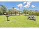 Outdoor picnic area with a grill and tables, offering residents a perfect spot for community gatherings at 339 Cicadas Song, Moncks Corner, SC 29461