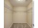 Empty walk-in closet with shelving at 339 Cicadas Song, Moncks Corner, SC 29461