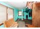Bedroom requiring renovation featuring peeling paint, a damaged closet, and deteriorated furniture at 355 Nassau St, Charleston, SC 29403