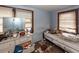 Bedroom shows damage and clutter on a dresser with peeling paint; repair and restoration are required at 355 Nassau St, Charleston, SC 29403