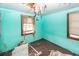 Damaged room needing renovation, showing missing ceiling and tattered walls at 355 Nassau St, Charleston, SC 29403