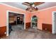 A dining room shows significant damage and disrepair, presenting a fixer-upper opportunity at 355 Nassau St, Charleston, SC 29403