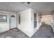 Covered front porch with white railings and view of the house's entrance at 355 Nassau St, Charleston, SC 29403