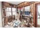 Sun room shows significant disrepair, with exposed framing and missing drywall; repair needed at 355 Nassau St, Charleston, SC 29403
