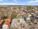 A high-angle shot reveals a neighborhood with a diverse array of colorful homes at 42 Kennedy St, Charleston, SC 29403