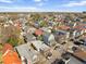 An aerial view showcases a residential neighborhood with charming homes and tree-lined streets at 42 Kennedy St, Charleston, SC 29403