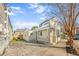 Charming home with a welcoming front porch, well-maintained landscaping, and a private backyard seating area at 42 Kennedy St, Charleston, SC 29403