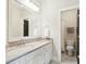 Bright bathroom with double sinks, white cabinets and granite countertops at 425 Mccants Dr, Mount Pleasant, SC 29464