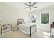 Bright bedroom featuring two large windows, light colored carpet and simple decor at 425 Mccants Dr, Mount Pleasant, SC 29464