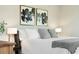 A beautifully decorated bedroom with floral prints above the bed at 425 Mccants Dr, Mount Pleasant, SC 29464