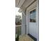 Charming balcony with a traditional-style front door and beautiful architectural details at 425 Mccants Dr, Mount Pleasant, SC 29464