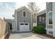 View of detached two-car garage on a concrete driveway with green landscaping at 425 Mccants Dr, Mount Pleasant, SC 29464