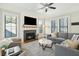 Inviting living room with a modern fireplace, comfortable seating, and ample natural light at 425 Mccants Dr, Mount Pleasant, SC 29464