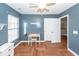 Bedroom featuring herringbone floors, a ceiling fan, a desk, and a window at 426 Mountain Laurel Cir, Goose Creek, SC 29445