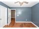 Bedroom featuring herringbone floors, a ceiling fan, and open closet at 426 Mountain Laurel Cir, Goose Creek, SC 29445