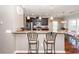 An eat-in kitchen is adjacent to a breakfast bar with seating at 426 Mountain Laurel Cir, Goose Creek, SC 29445