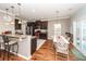 Modern kitchen with granite countertops, stainless steel appliances, and a breakfast bar, perfect for casual dining at 426 Mountain Laurel Cir, Goose Creek, SC 29445
