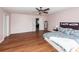 Hardwood floors and neutral paint create a modern feel in this spacious main bedroom at 426 Mountain Laurel Cir, Goose Creek, SC 29445