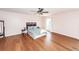Spacious bedroom featuring hardwood floors, a ceiling fan, and large windows at 426 Mountain Laurel Cir, Goose Creek, SC 29445