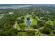 Picturesque aerial view of a green park with walking paths and a lake in a neighborhood at 5 Maranda Holmes St, Charleston, SC 29403