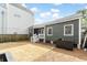 Newly sodded backyard featuring an adjacent home with dark green siding at 5 Maranda Holmes St, Charleston, SC 29403