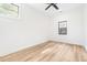 Bright bedroom featuring two windows that provide lots of natural light and light wood floors at 5 Maranda Holmes St, Charleston, SC 29403