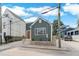 Charming home with green siding, a wooden door, and well-manicured landscaping at 5 Maranda Holmes St, Charleston, SC 29403