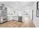 Bright, modern kitchen with stainless steel appliances and views into the living space at 5 Maranda Holmes St, Charleston, SC 29403