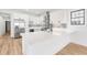 Modern kitchen with stainless steel appliances, white cabinetry, and sleek quartz countertops at 5 Maranda Holmes St, Charleston, SC 29403