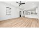 Open-concept living room with modern ceiling fan, recessed lighting, and hardwood floors at 5 Maranda Holmes St, Charleston, SC 29403