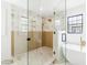 A spacious shower with glass enclosure, mosaic tile floor, and stylish fixtures at 5 Maranda Holmes St, Charleston, SC 29403