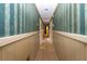 Hallway with striped wallpaper at 609 Levee Dr, Moncks Corner, SC 29461