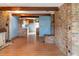 Spacious living room with brick accents and wood flooring at 609 Levee Dr, Moncks Corner, SC 29461