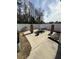 Well-maintained backyard with patio area, dining set, and garden features at 618 Hilchot Dr, Summerville, SC 29486