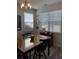 Inviting dining area with natural light, charming decor, and room for entertaining guests at 618 Hilchot Dr, Summerville, SC 29486