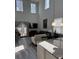 Bright living room with vaulted ceilings, sliding glass doors, and stylish decor at 618 Hilchot Dr, Summerville, SC 29486