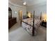 Comfortable bedroom with a ceiling fan, a four-poster bed and ample natural light at 618 Hilchot Dr, Summerville, SC 29486