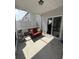 Cozy, covered patio area featuring comfortable seating and a peaceful ambiance at 618 Hilchot Dr, Summerville, SC 29486