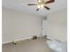 Simple bedroom with neutral tones and a ceiling fan at 9009 Cat Tail Pond Rd, Summerville, SC 29485