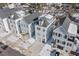 Aerial view of a neighborhood with modern homes and snow covered rooftops at 1002 Carmela Ct, North Charleston, SC 29405