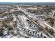 Snow covered streets and treetops in an aerial view of a neighborhood at 1002 Carmela Ct, North Charleston, SC 29405