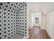 The stylish shower features striking blue and white star-patterned tiles and a modern showerhead at 1002 Carmela Ct, North Charleston, SC 29405