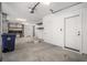 Spacious garage with high ceilings, storage shelves, and ample room for parking at 1002 Carmela Ct, North Charleston, SC 29405
