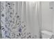 A bathroom with blue floral design curtain at 105 Peacock Pl, Summerville, SC 29485