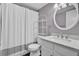 Bathroom featuring a vanity with marble countertop and a tub with shower curtain at 105 Peacock Pl, Summerville, SC 29485