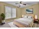 Cozy bedroom with neutral tones, large window, and comfortable furniture at 105 Peacock Pl, Summerville, SC 29485
