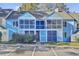 Charming, brightly colored townhome featuring screened porches and convenient parking at 105 Peacock Pl, Summerville, SC 29485