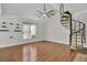 Spacious living room with spiral staircase and ample natural light at 105 Peacock Pl, Summerville, SC 29485