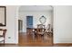 Dining room with hardwood floors and classic trim, featuring a round table with seating for four at 105 S Palmetto St, Summerville, SC 29483